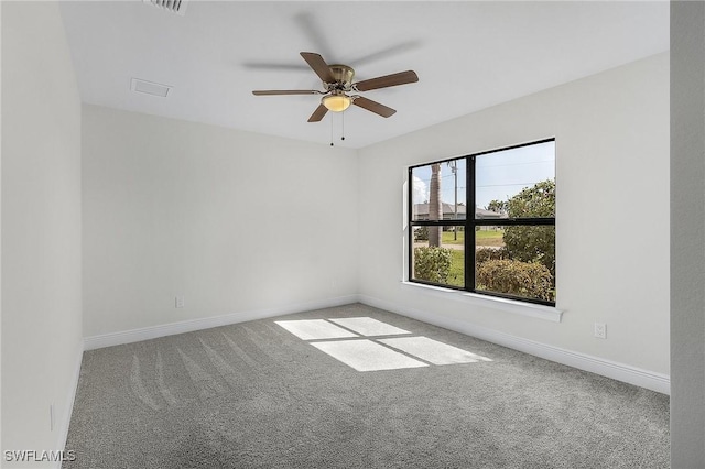 1729 SW 22nd Ter, Cape Coral, FL 33991 - spare room featuring carpet and ceiling fan