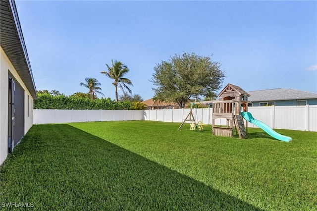 1729 SW 22nd Ter, Cape Coral, FL 33991 - view of yard with a playground