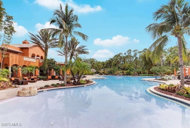 pool featuring a patio area