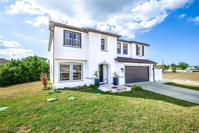 view of front of house with a garage and a front yard