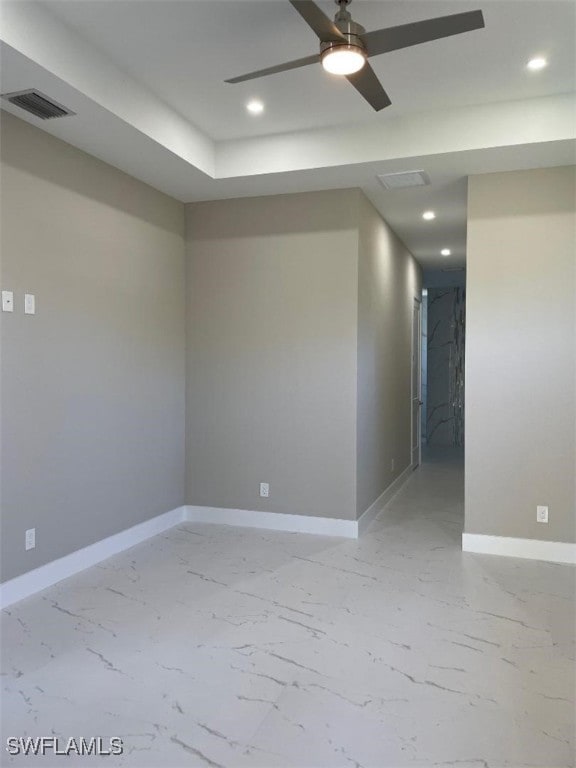 spare room with visible vents, baseboards, recessed lighting, marble finish floor, and a ceiling fan