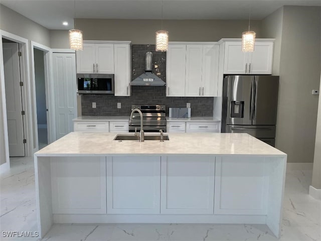 kitchen featuring stainless steel appliances, marble finish floor, and wall chimney range hood