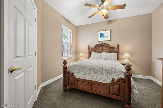 bedroom featuring ceiling fan, dark carpet, and baseboards