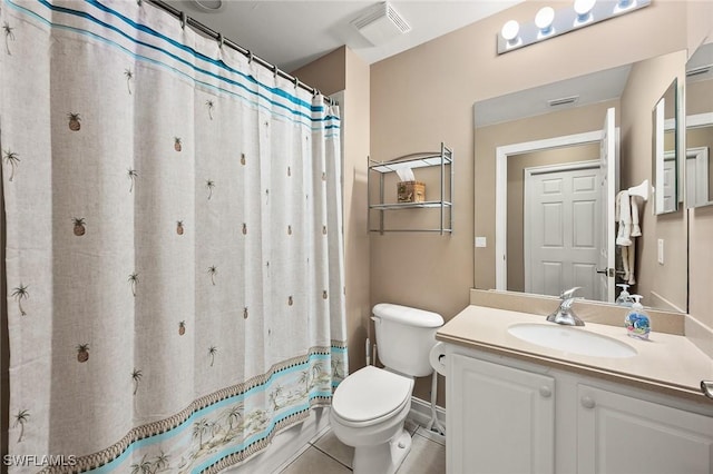 bathroom featuring curtained shower, visible vents, toilet, vanity, and tile patterned floors