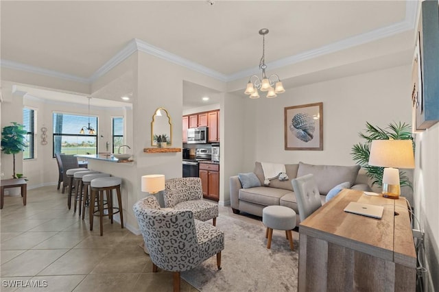 living area featuring a chandelier, light tile patterned floors, ornamental molding, and baseboards