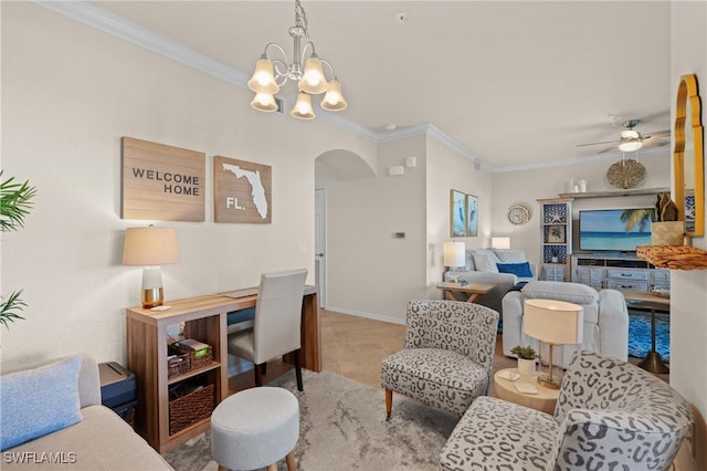 living room featuring baseboards, ornamental molding, arched walkways, and ceiling fan with notable chandelier