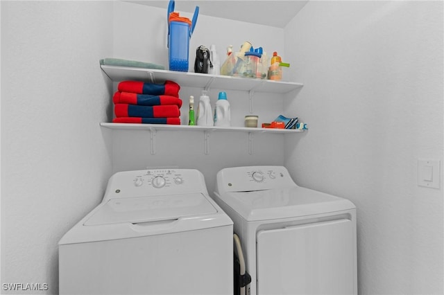 laundry room featuring laundry area and washing machine and dryer