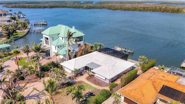 birds eye view of property featuring a water view