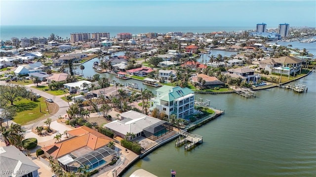 drone / aerial view with a water view