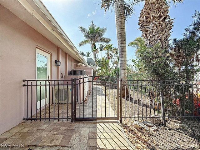 view of gate featuring fence