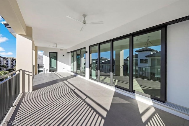 balcony featuring ceiling fan