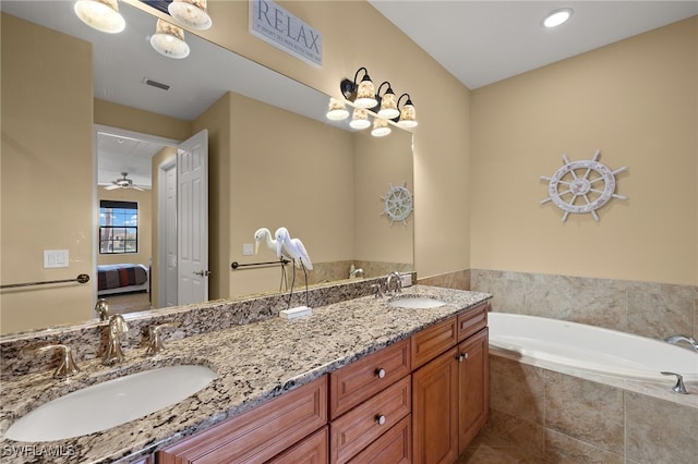 full bath featuring double vanity, visible vents, a sink, and ensuite bathroom