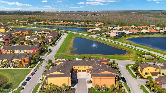 aerial view with a water view and a residential view