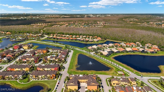 aerial view featuring a water view and a residential view