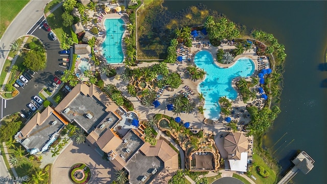 birds eye view of property featuring a water view