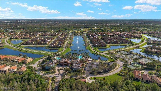 bird's eye view with a residential view and a water view