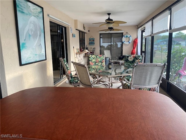 dining room featuring ceiling fan