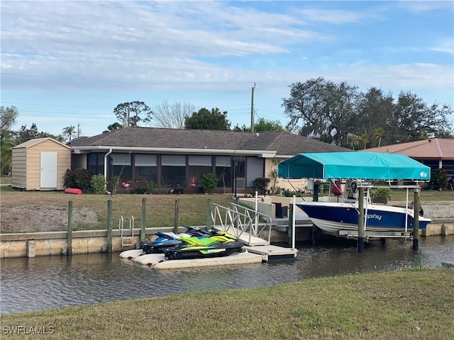 view of dock featuring a water view and boat lift