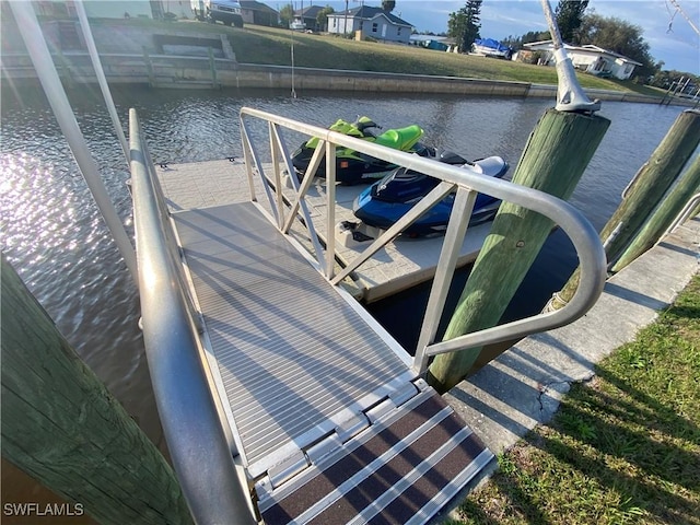 view of dock with a water view