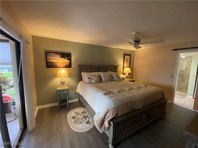 bedroom with dark wood finished floors, a textured ceiling, baseboards, and ceiling fan