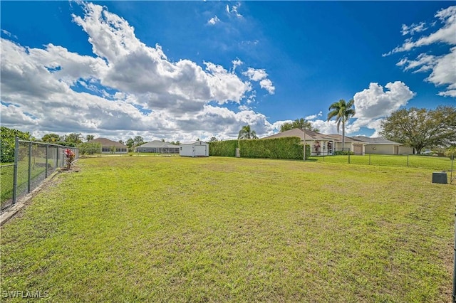 view of yard with fence