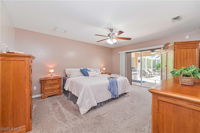 bedroom with access to exterior, visible vents, ceiling fan, and light carpet