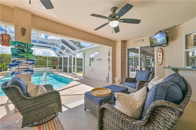 outdoor pool featuring a patio, glass enclosure, an outdoor living space, and a ceiling fan