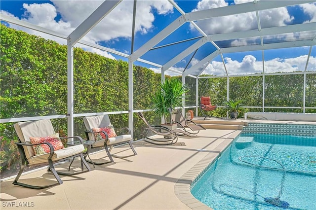 pool featuring a patio and a lanai