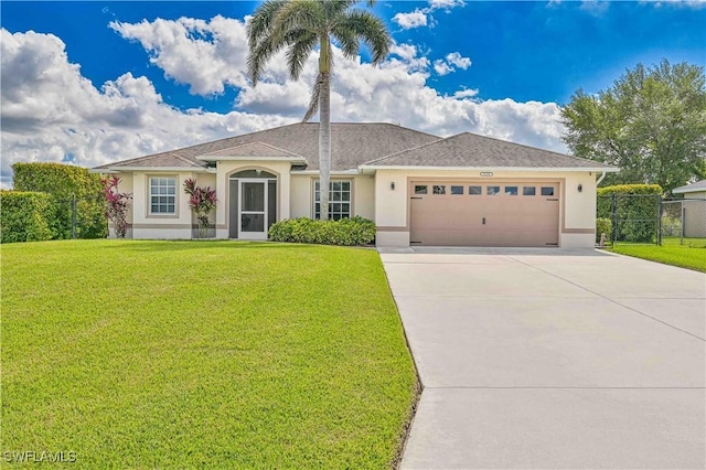 ranch-style home with a garage, concrete driveway, a front yard, and stucco siding