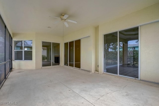 view of patio / terrace featuring ceiling fan