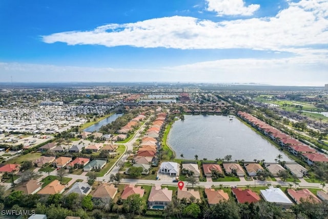 drone / aerial view with a water view