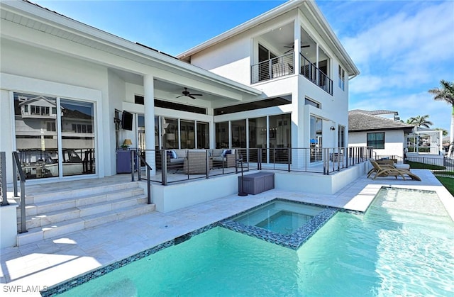 rear view of house with an outdoor hangout area, a ceiling fan, and a patio