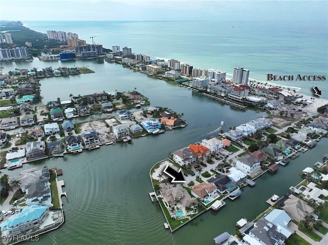 bird's eye view featuring a water view and a view of city