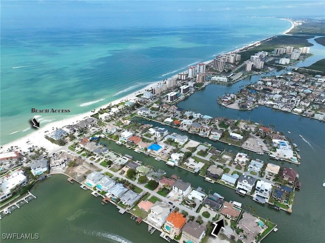 drone / aerial view with a water view and a city view