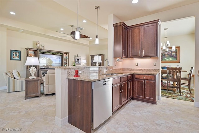 kitchen featuring stainless steel dishwasher, recessed lighting, a sink, and light stone countertops