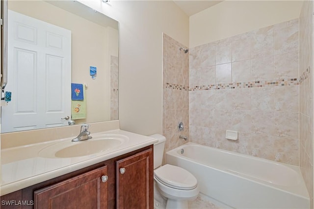 bathroom with toilet, bathtub / shower combination, and vanity