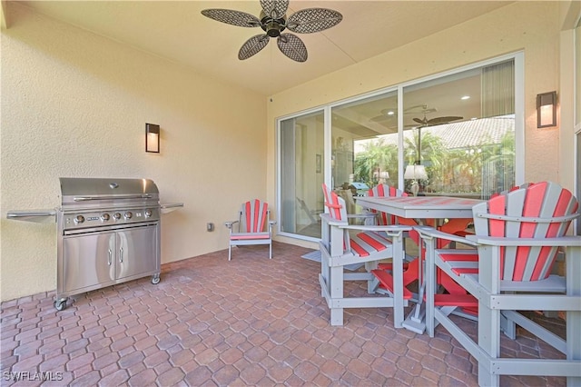 view of patio / terrace featuring a ceiling fan and a grill