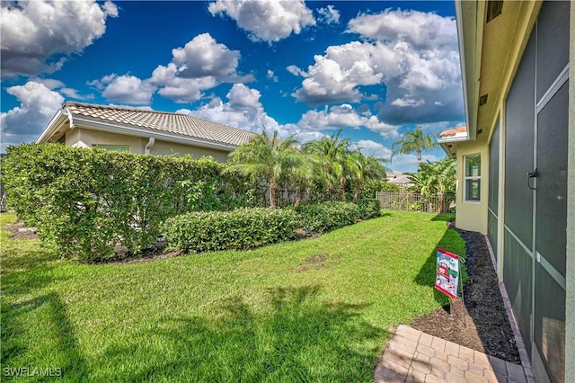 view of yard with fence