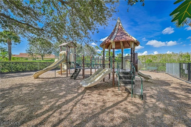 community playground featuring fence