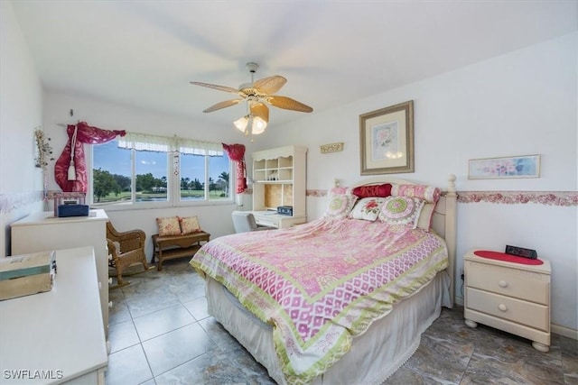 bedroom featuring ceiling fan