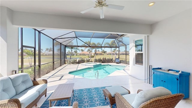 view of pool with a ceiling fan, a patio, an outdoor hangout area, a lanai, and a pool with connected hot tub