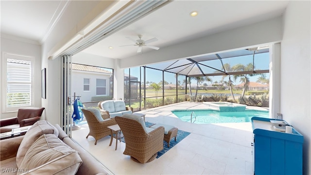 view of pool with glass enclosure, ceiling fan, a patio area, a pool with connected hot tub, and an outdoor living space