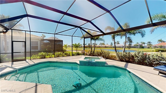 view of swimming pool with a patio area, a lanai, a pool with connected hot tub, and a water view