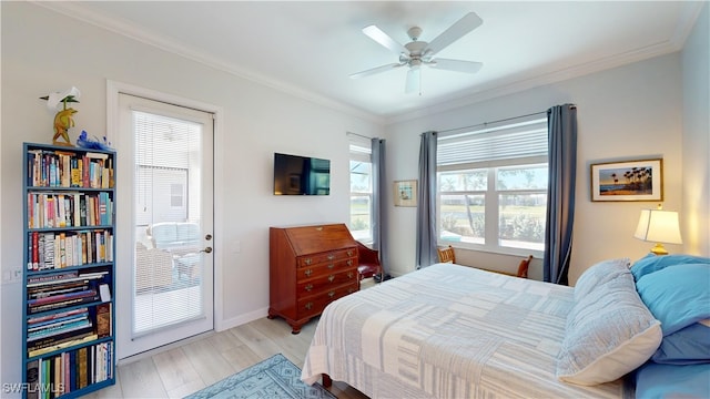 bedroom with ceiling fan, ornamental molding, light wood-type flooring, and baseboards