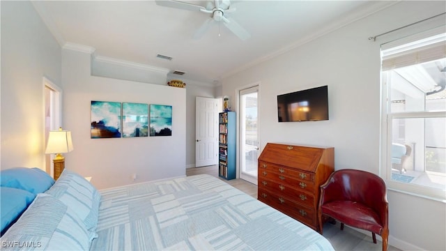 bedroom with ceiling fan, baseboards, visible vents, and crown molding