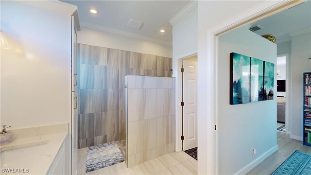 bathroom with a walk in shower, ornamental molding, visible vents, and recessed lighting