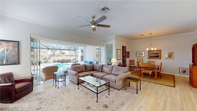 living room featuring visible vents, crown molding, light wood-style flooring, and ceiling fan with notable chandelier