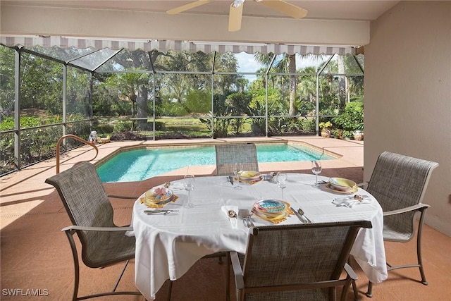 outdoor pool featuring a patio area and a lanai