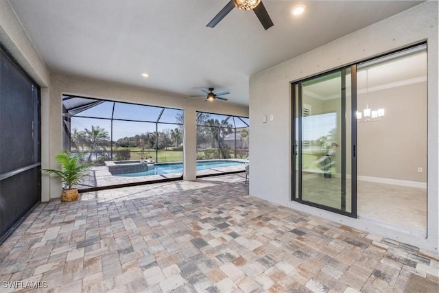 unfurnished sunroom featuring a swimming pool and ceiling fan with notable chandelier