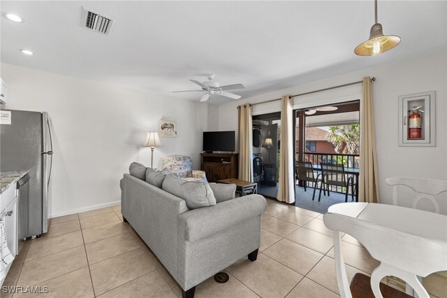 1811 Olde Middle Gulf Dr Unit 10, Sanibel, FL 33957 - living area featuring recessed lighting, visible vents, a ceiling fan, light tile patterned flooring, and baseboards